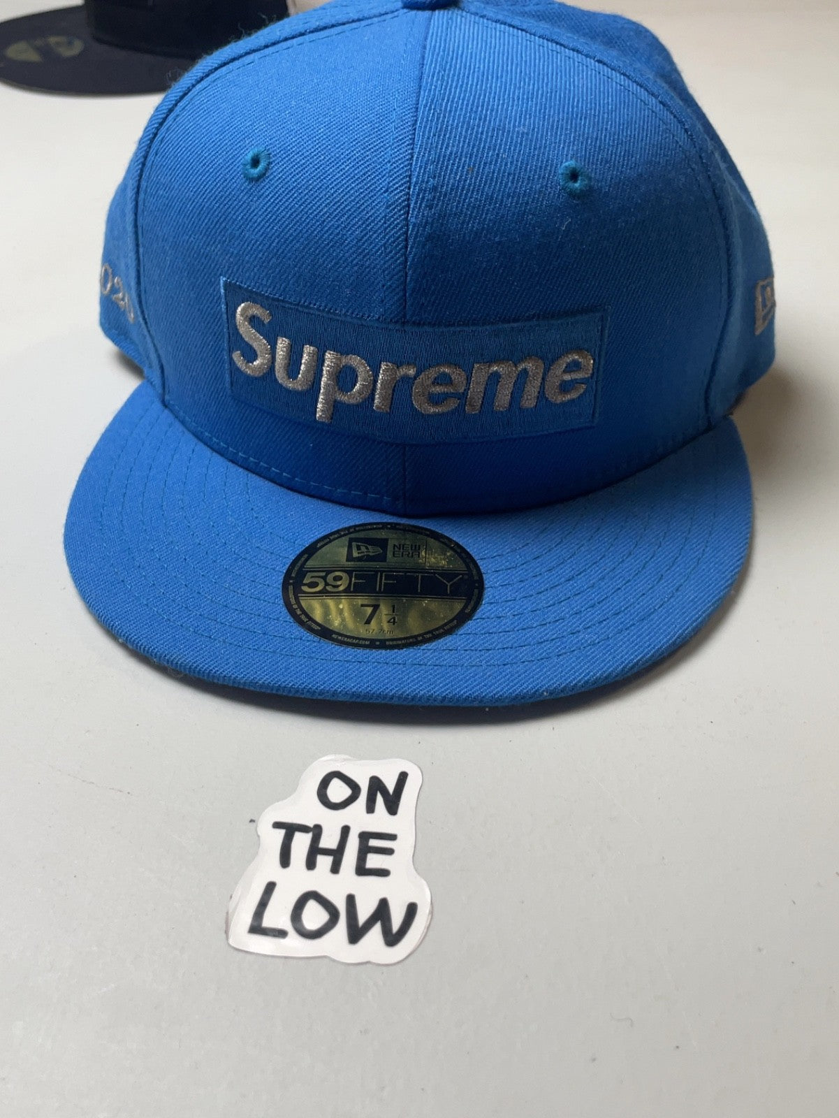 Supreme $1M Metallic Box Logo New Era 2020 Light Blue Baseball Cap
