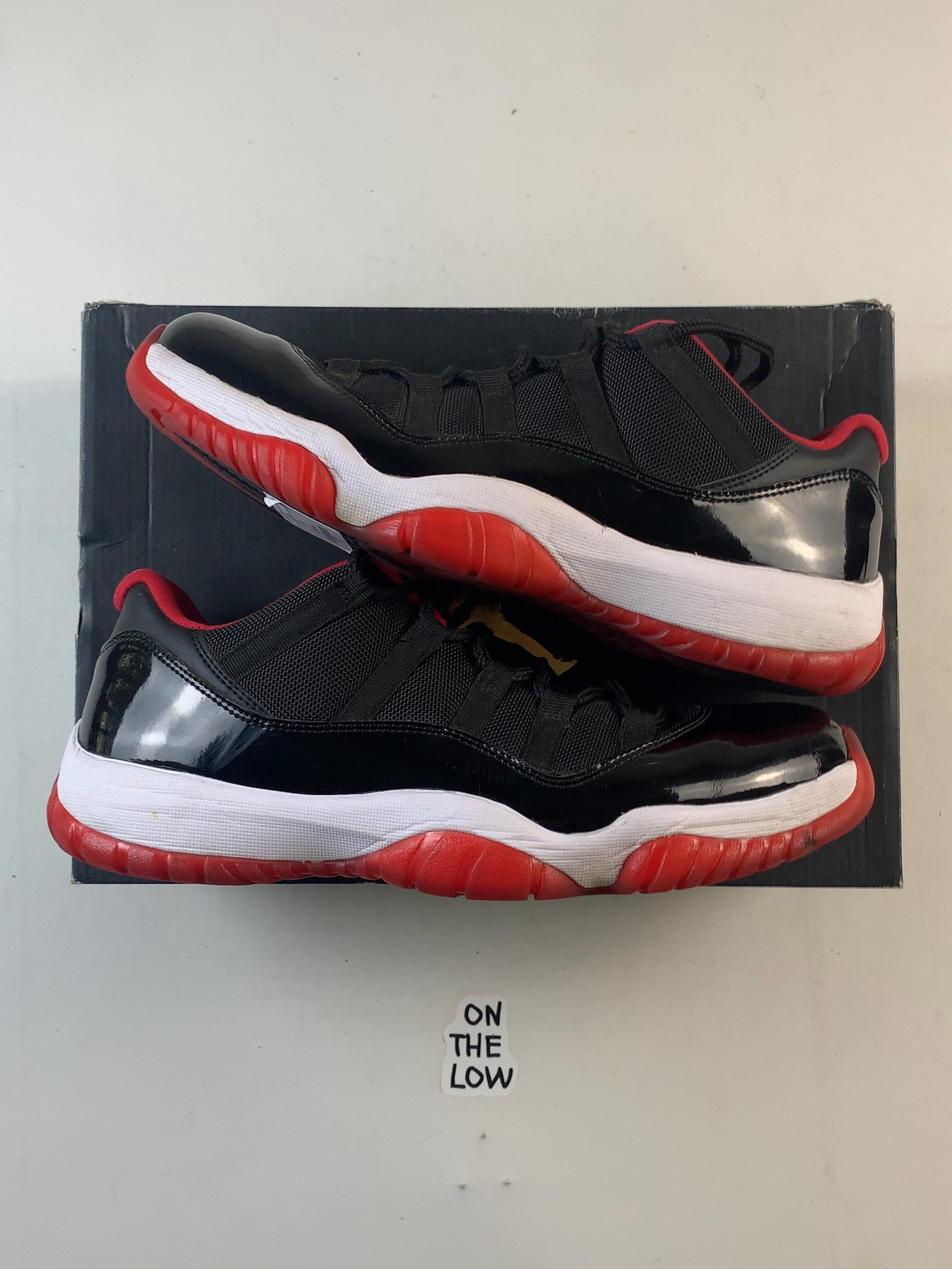 Jordan 11 Retro Low Bred (2015) (USED) — Drive 1_ArWukMcLLx1tW8OQxr2VWkgeimg1Zb4 — photo 1