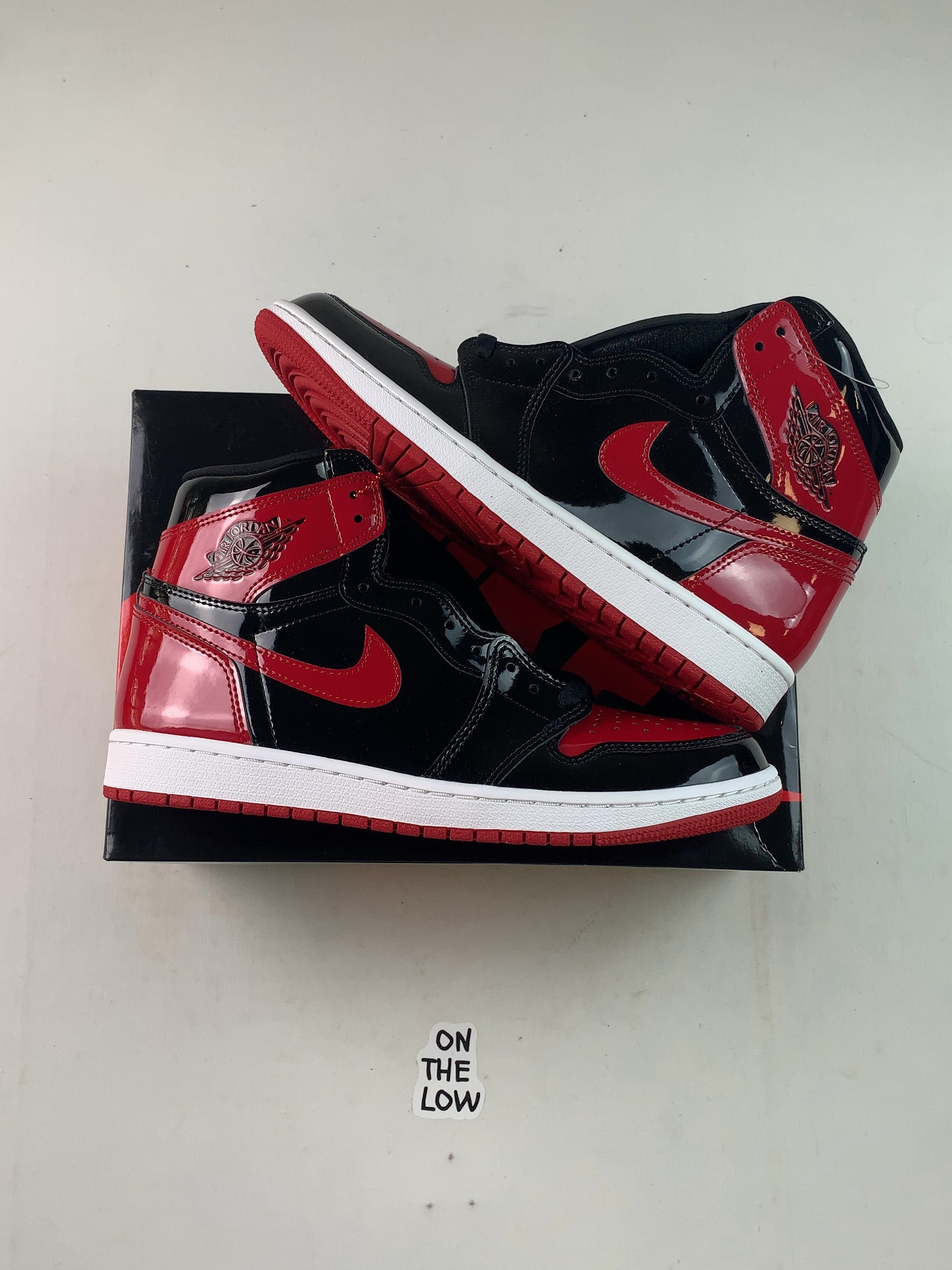 Jordan 1 Retro High OG Patent Bred — Drive 1bNSihwiMpr5vgrBgRf4yHUPXWURUFQ0O — photo 1